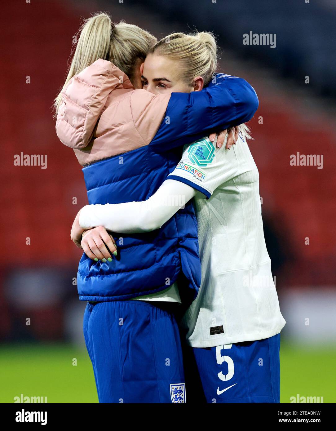 England's Alex Greenwood (right) hugs team-mate Rachel Daly at the end ...