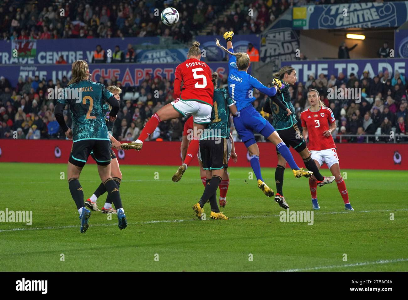 Swansea, Wales. UK. 05th Dec, 2023. Goal keeper Merle Frohms (#1)  punches the ball away from Rhiannon Robers (#5)  during Wales' draw with Germany in Swansea.  5th Dec 2023.  Credit Alamy Lve News / Penallta Photographics Credit: Penallta Photographics/Alamy Live News Stock Photo