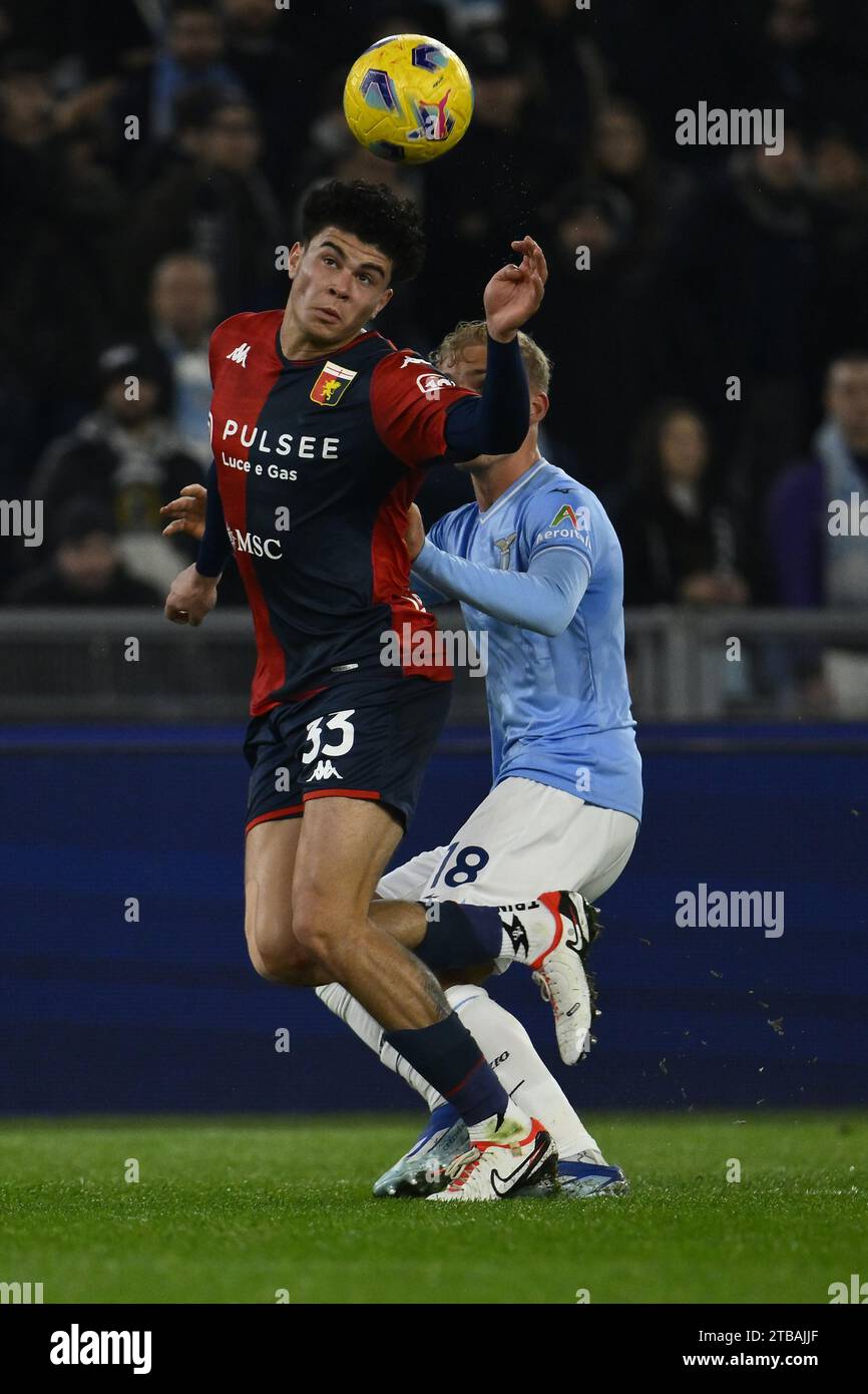 Rome, Italy. 05th Dec, 2023. Alan Matturro of Genoa C.F.C. and Gustav Isaksen of S.S. Lazio during the round of 16 of the Frecciarossa Italian Cup between S.S. Lazio - Genoa C.F.C., 5 December 2023 at the Olympic Stadium in Rome. Credit: Independent Photo Agency/Alamy Live News Stock Photo