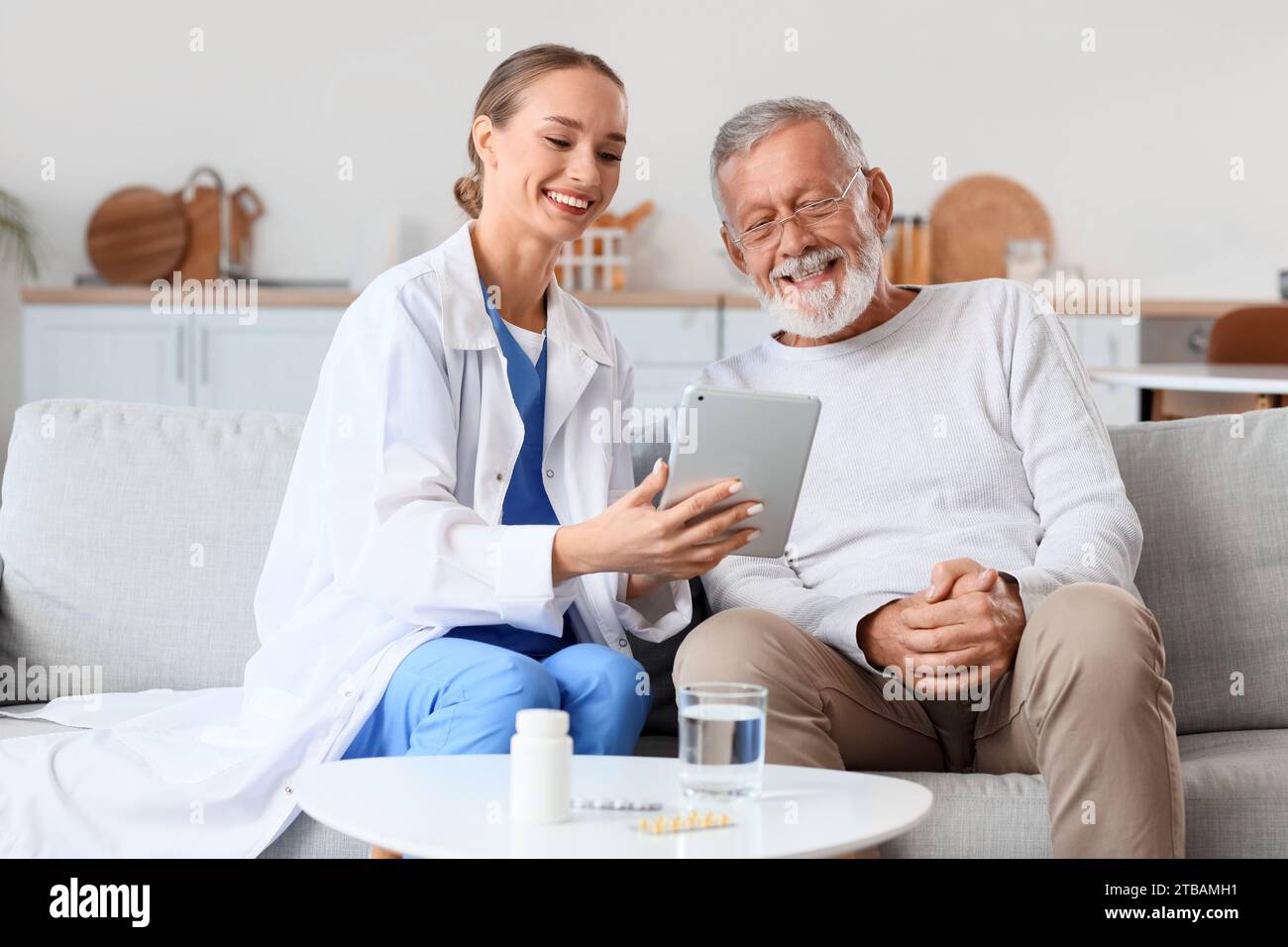 Portrait caregiver woman tablet hi-res stock photography and images - Alamy