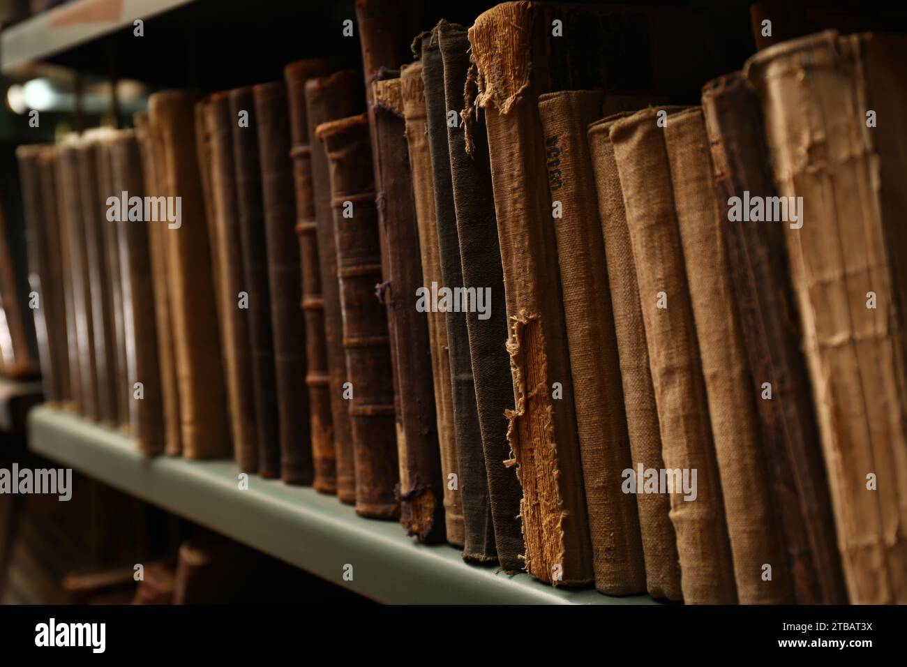 Old books on shelf in library, closeup Stock Photo - Alamy