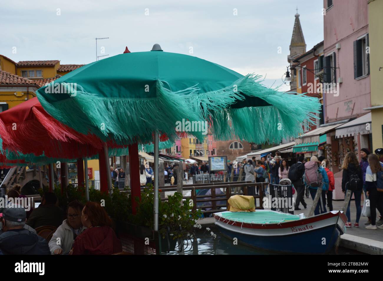 Shopping on a windy day along the canals on Murano Italy Stock Photo