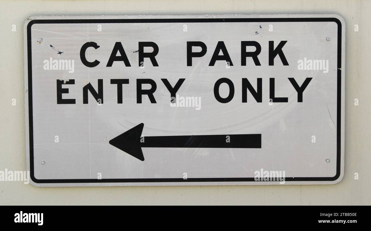 Car park entry only with arrow road sign Stock Photo