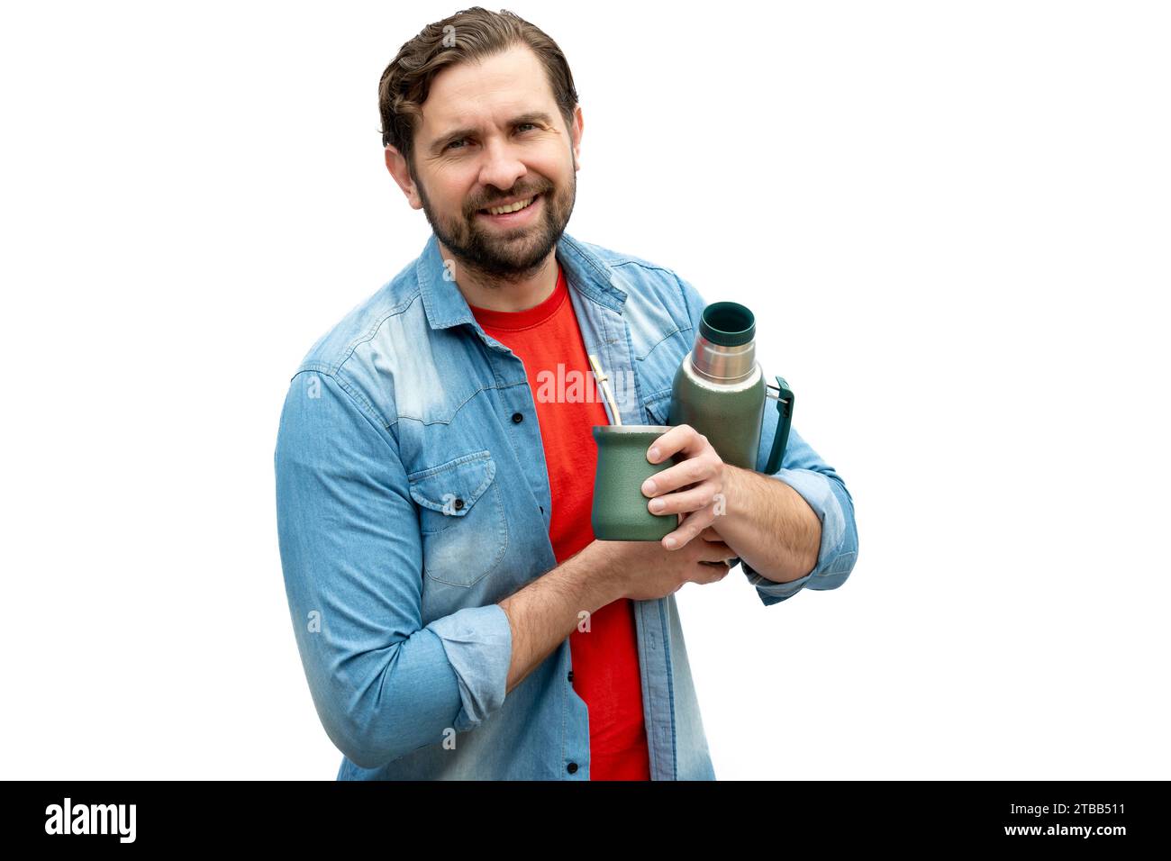 Casually dressed Argentinian with thermos and mate in hand. Real representation of Argentine people. Stock Photo