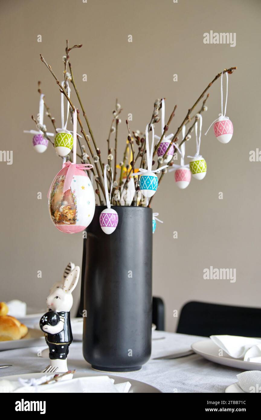 Decorated table served for Easter dinner Stock Photo