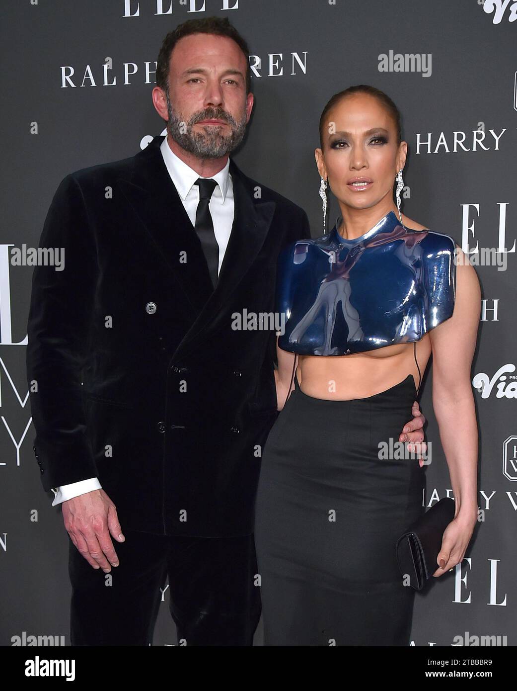 Ben Affleck, left, and Jennifer Lopez attend the ELLE Women in ...