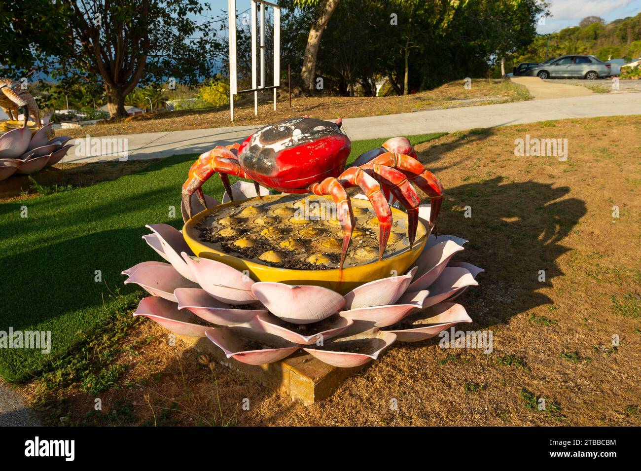 A Red Crab Statue in Zhen Jian Tong Xiu Hui Temple Complex in Poon Saan, a small Chinese Village on Christmas Island, Australia Stock Photo
