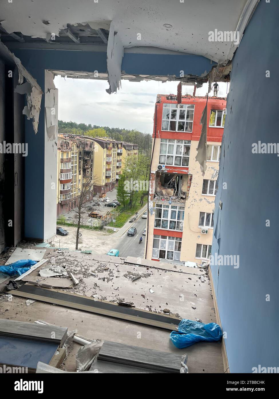 Irpen, Ukraine. May 07. 2022 View of a neighboring house from a ruined ...