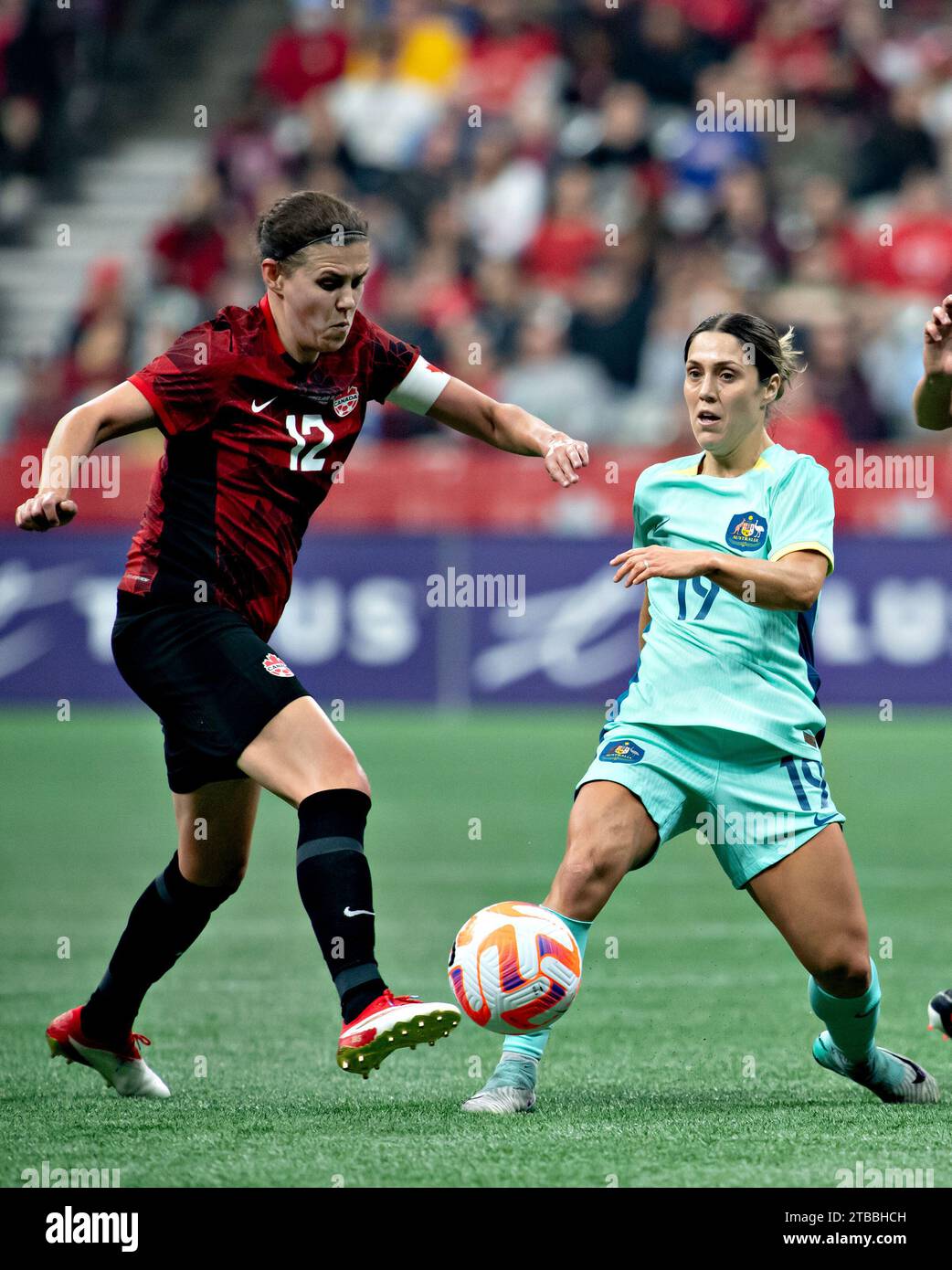 Vancouver, Canada. 5th Dec, 2023. Christine Sinclair (L) of Canada vies with Katrina Gorry of Australia during a women's international friendly football match in Vancouver, Canada, Dec. 5, 2023. Credit: Andrew Soong/Xinhua/Alamy Live News Stock Photo