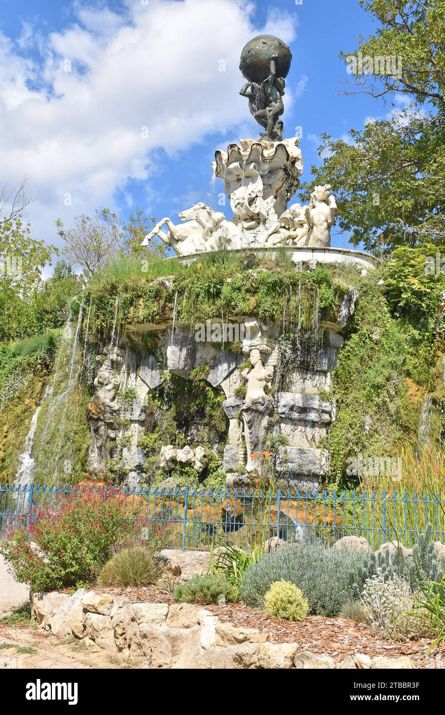 The Lac des Grottes & Titan Fountain, in the Plateau des Poètes a remarkable landscaped garden, in the English style on a hillside in Béziers, France. Stock Photo