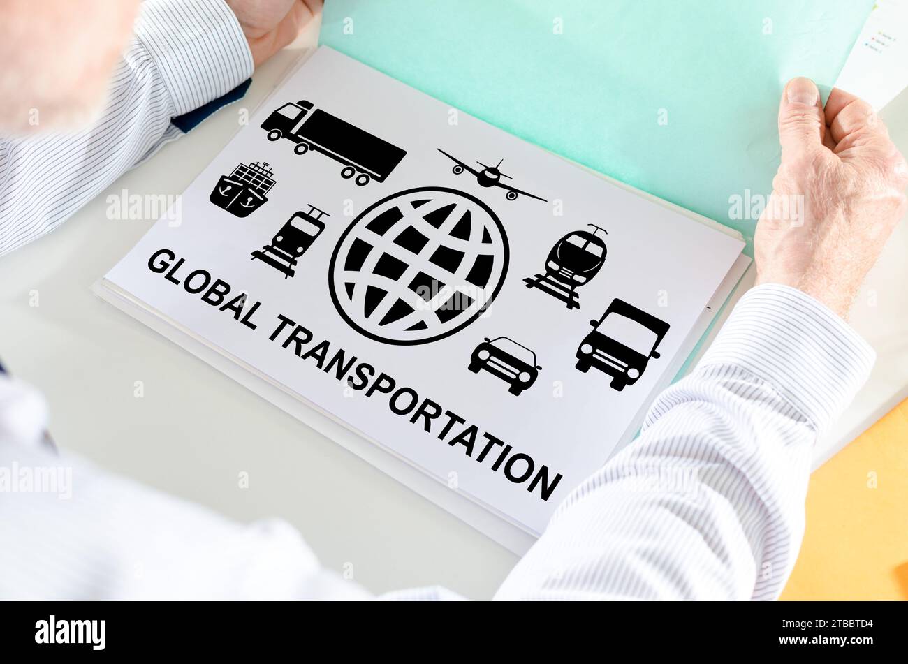 Transportation File Man holding a file with global transportation concept Stock Photo - Alamy