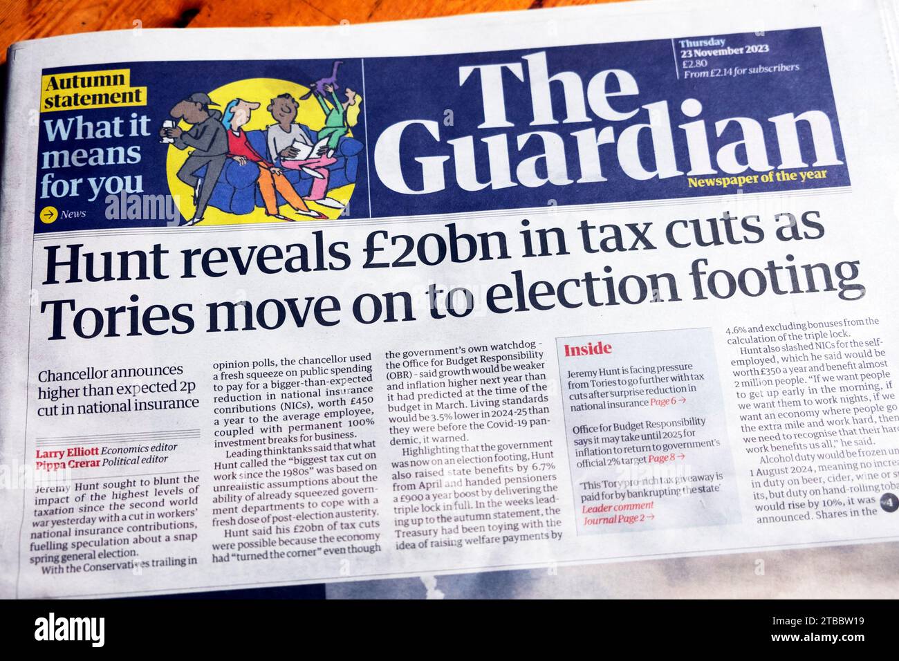 Jeremy 'Hunt reveals £20bn in tax cuts as Tories move onto election footing' Guardian newspaper headline British economy 21 November 2023 London UK Stock Photo