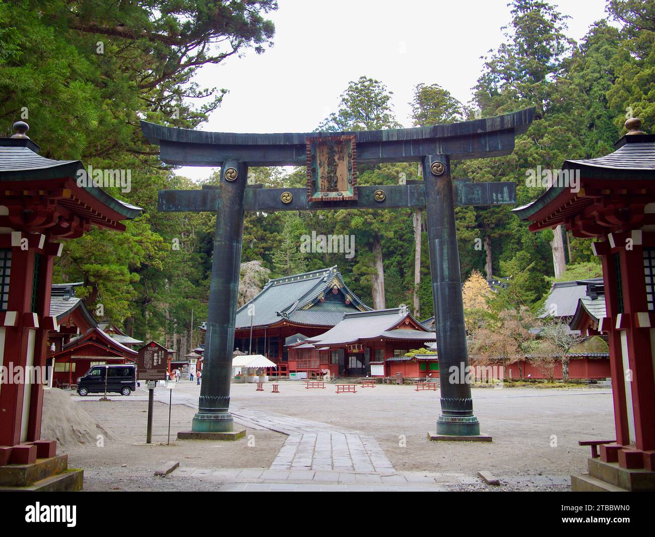 The front torii gate of the Futarasan Jinja shrine in Nikko, Japan. This shrine was founded in 767 by Shodo Shonin. Stock Photo