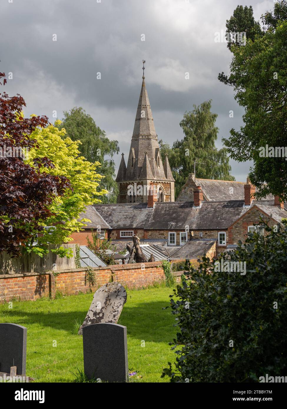 The churchyard in the village of Abthorpe, Northamptonshire, UK; with