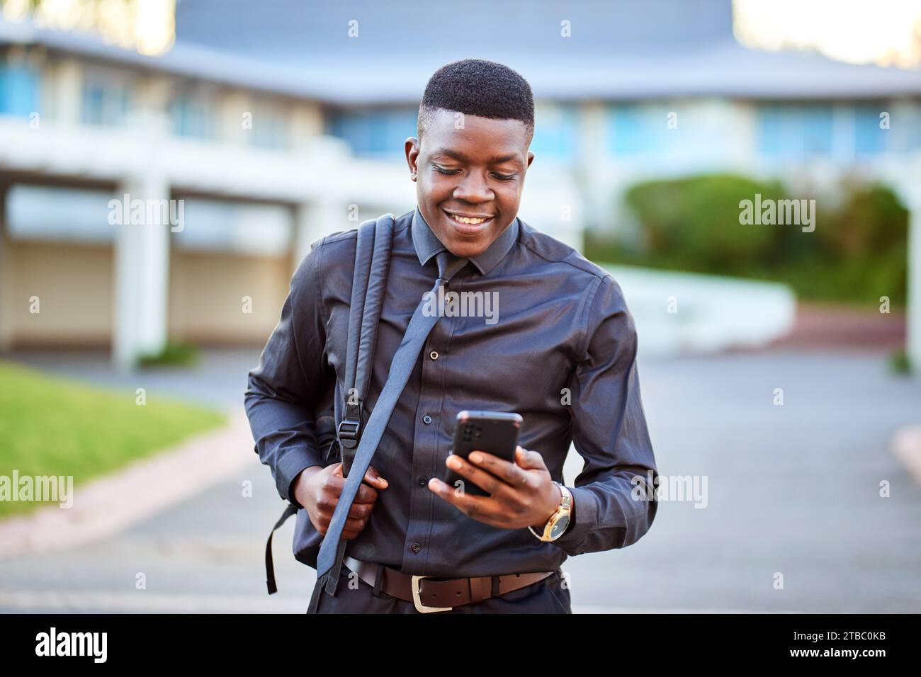 Black man walking inner city hi-res stock photography and images - Alamy