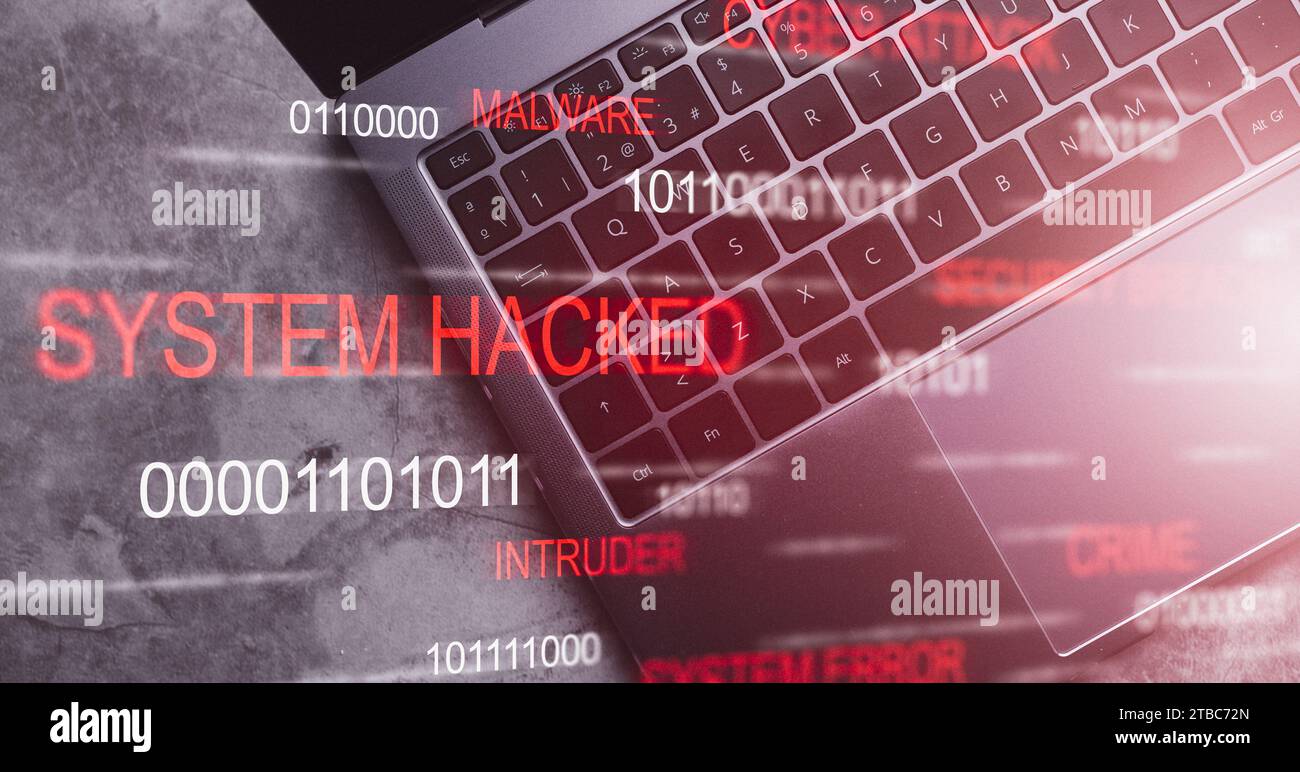 Top view desk of laptop keyboard with system hacked alert VR screen. Compromised information concept. Internet virus cyber security and cybercrime. Stock Photo