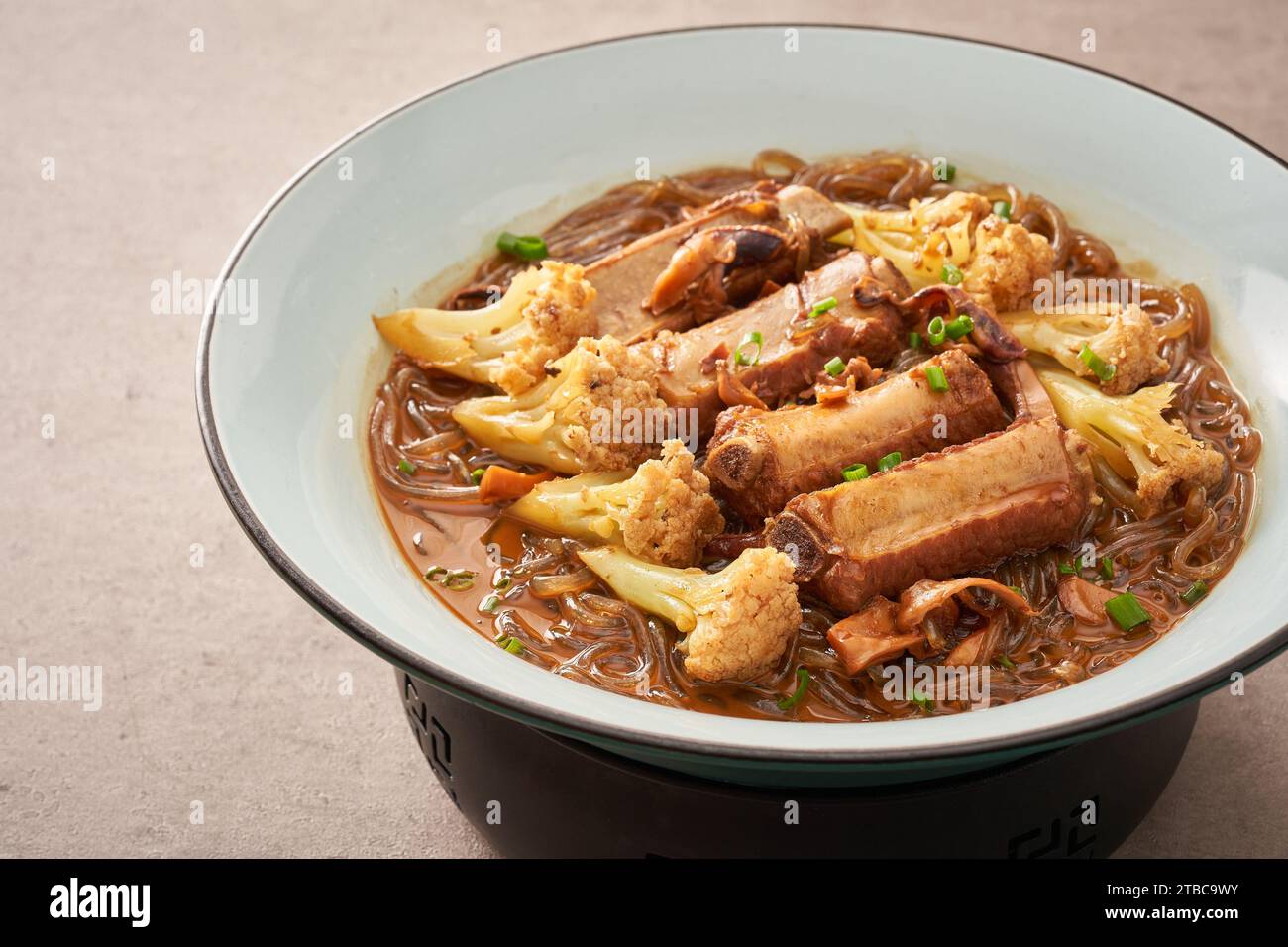 Sichuan sweet potato noodles with pork rib Stock Photo