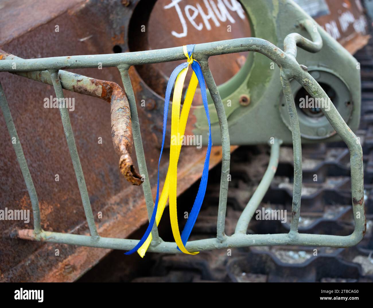 Kyiv, Ukraine -August 26, 2023: Close-up of yellow-blue ribbons tied on destroyed russian armored vehicles exhibited on Khreshchatyk Stock Photo