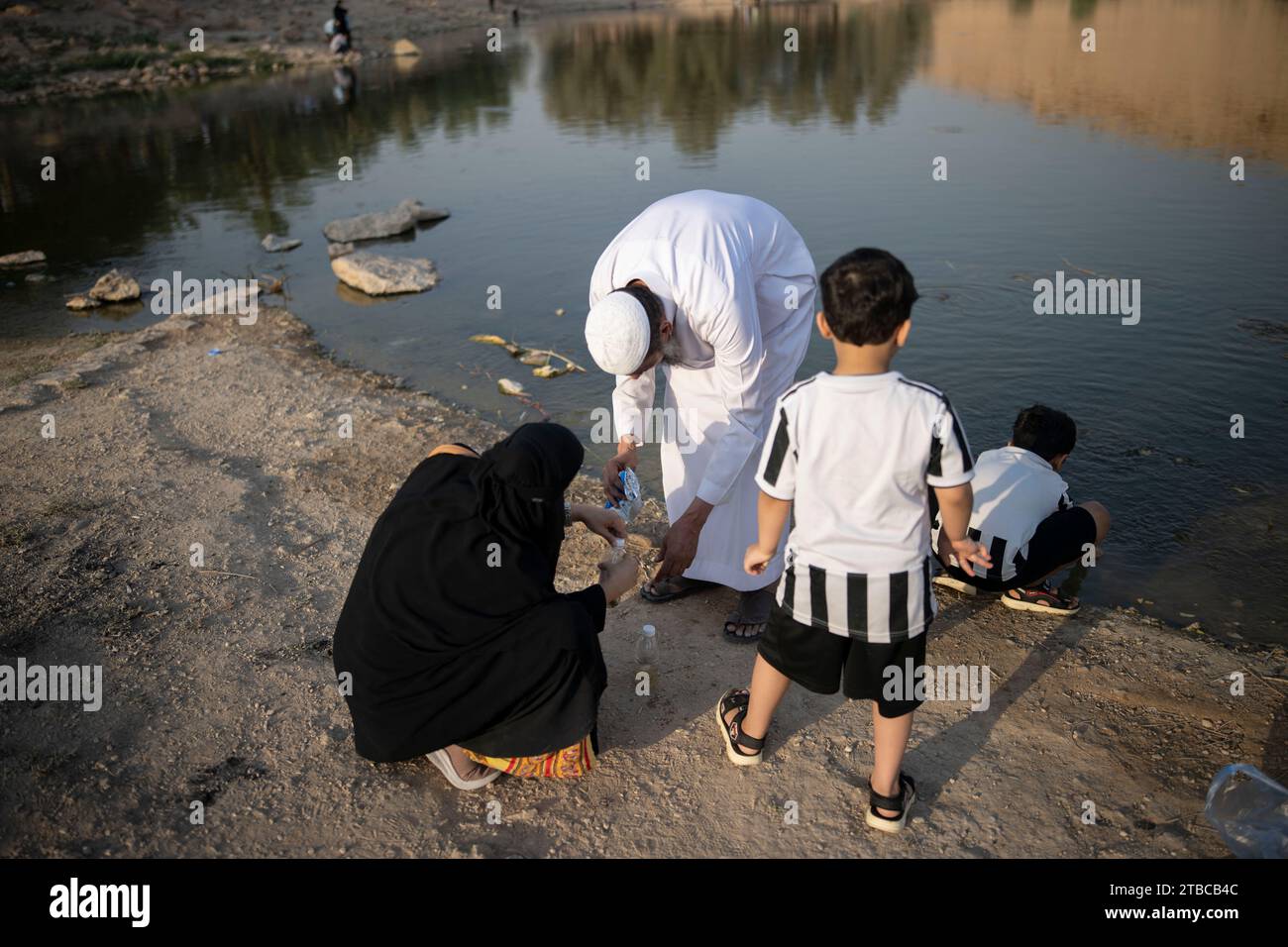 Daily life at Wadi Hanifa in Riyadh, Saudi Arabia on October 15, 2022, during the Noor Riyadh Festival 2022. Wadi Hanifa, historically known as Wadi al-Arad, is a wadi (seasonal river) in the Najd region, Riyadh Province, in central Saudi Arabia. The valley runs for a length of 120 km from northwest to southeast, cutting through the city of Riyadh. A string of towns and villages lie along the valley, including Uyaynah, Irqah and Diriyah. The historical city of Riyadh itself is on the northeastern side of the wadi, but the city has now expanded across Wadi Hanifa, with the sub-municipalities of Stock Photo