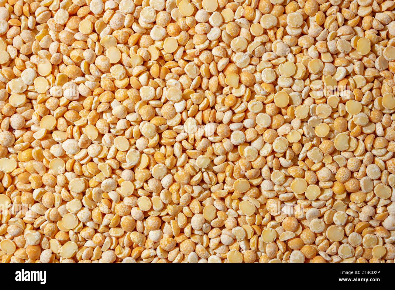 Uncooked Polished Split Peas Background. A Culinary Canvas of Dry
