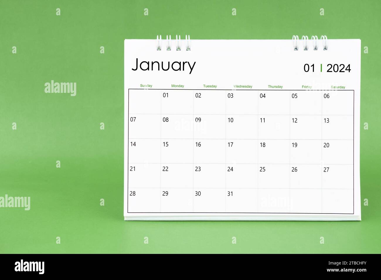 January 2024 desk calendar isolated in green color background Stock ...