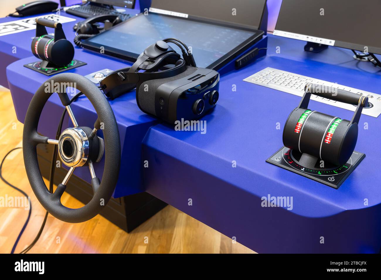Marine navigation simulation system, ship control panel with steering wheel and Virtual reality headset Stock Photo