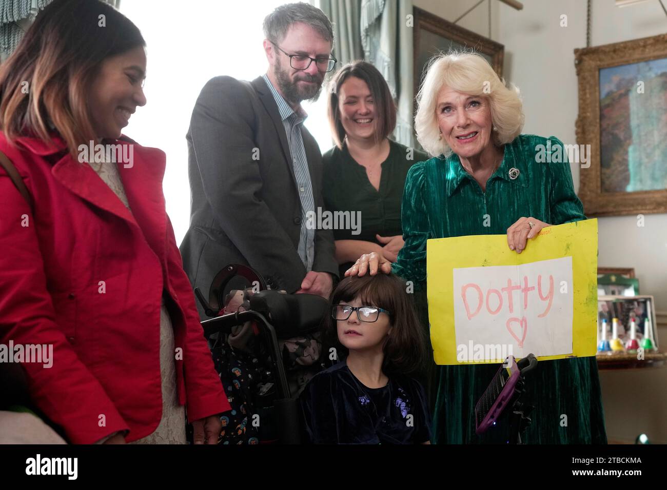 queen-camilla-welcomes-parents-and-children-supported-by-helen-and