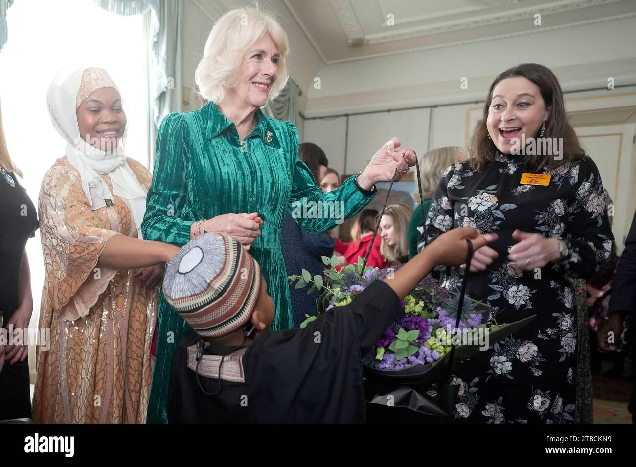 queen-camilla-accompanied-by-children-supported-by-helen-and-douglas
