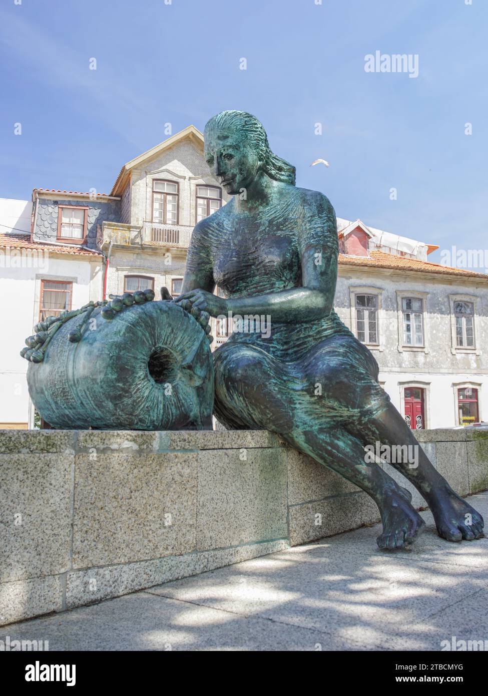 Iconic statue in homage to the countless women and girls who make lace in Vila do Conde, northern Portugal, an ancient activity in the city and with r Stock Photo
