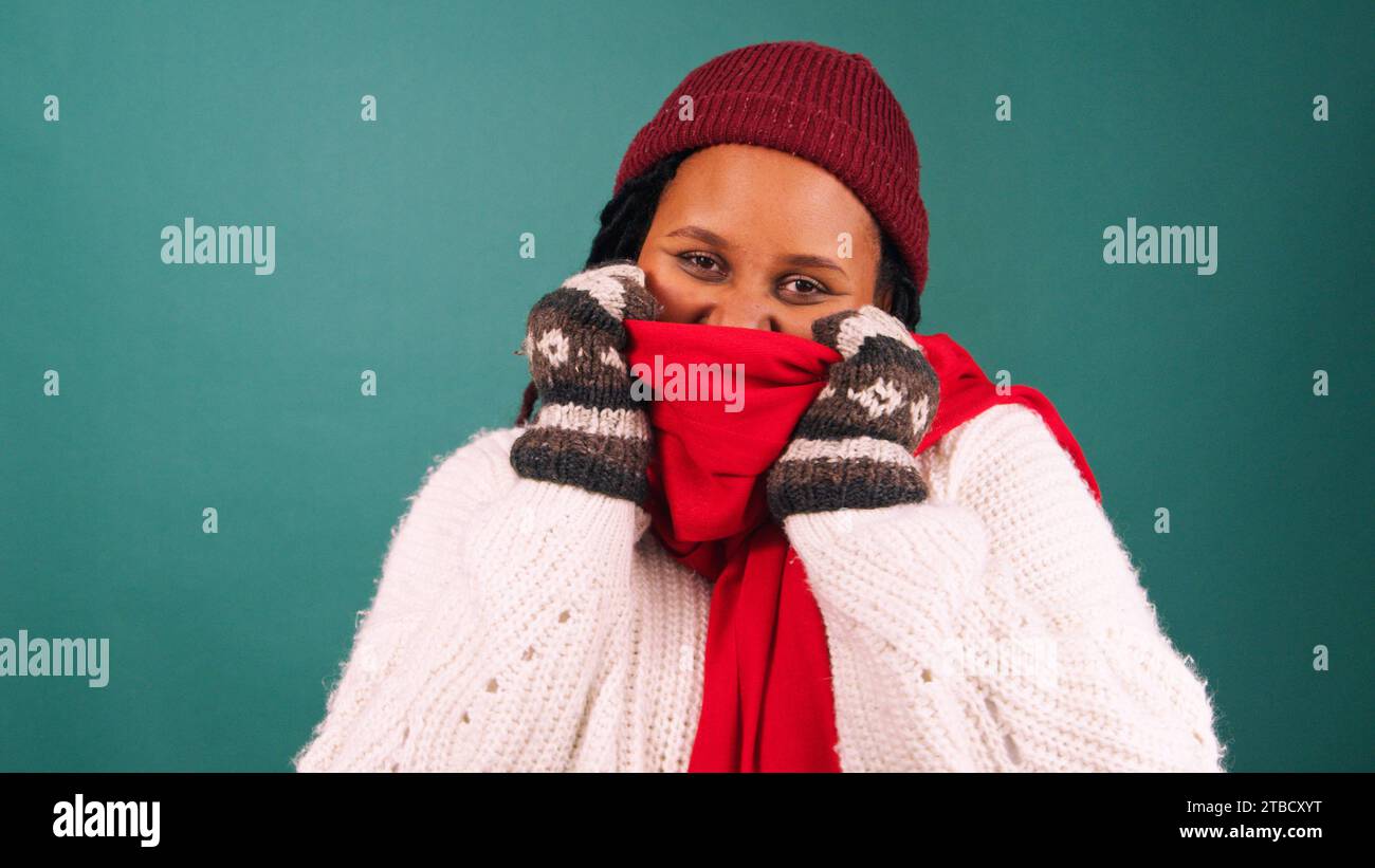 Woman bundled up against cold hi-res stock photography and images - Alamy