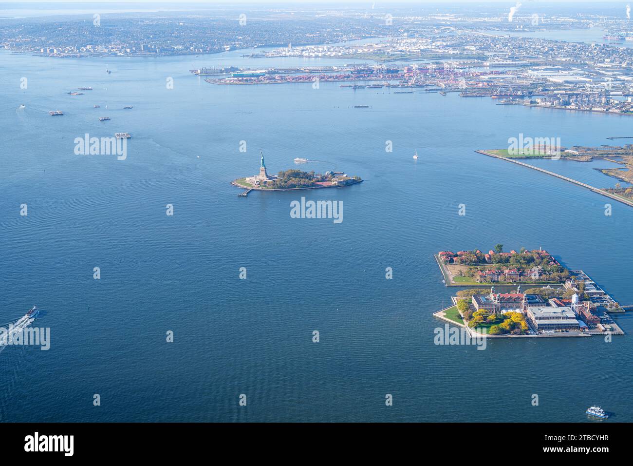 Liberty and Ellis Island are located in the upper New York Bay. Ellis was the entry point for immigrants from 1892 to 1943 Stock Photo