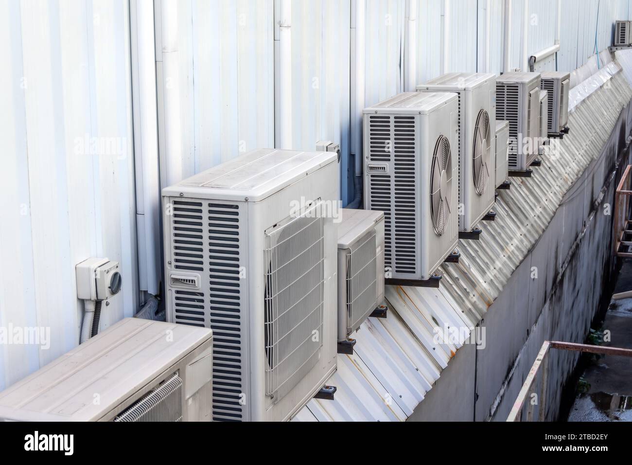 Air conditioners compressor outdoor unit installed many lot row outside