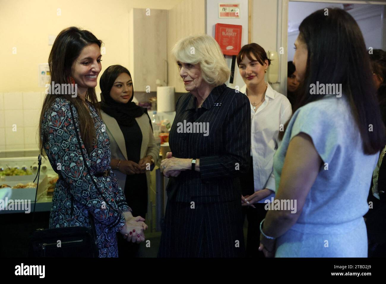 Queen Camilla during a visit to Ashiana women's refuge in London. Picture date: Wednesday December 6, 2023. Stock Photo