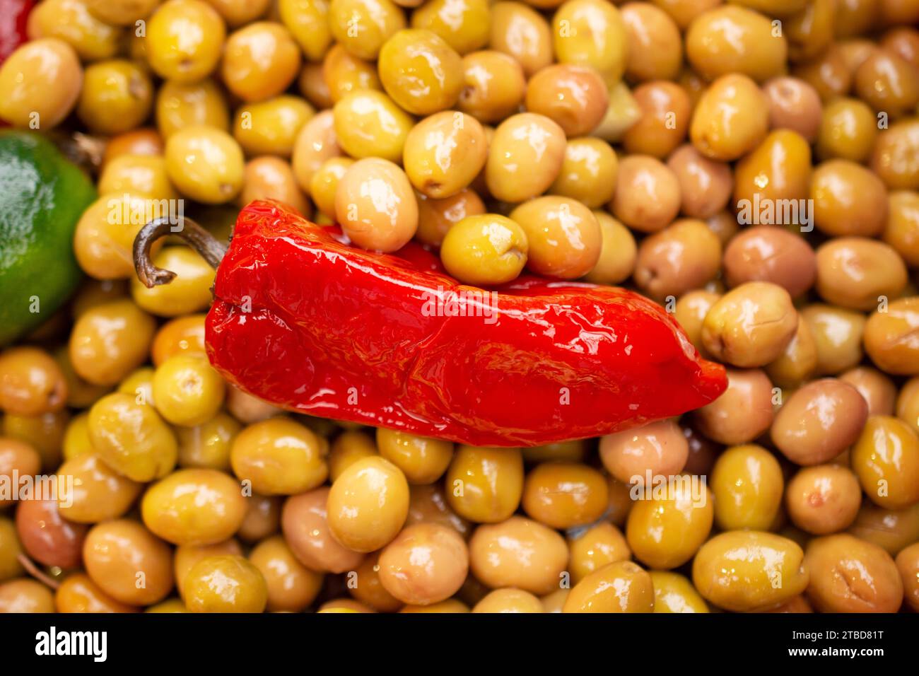 Green olives as health food preserved in olive oil Stock Photo Alamy