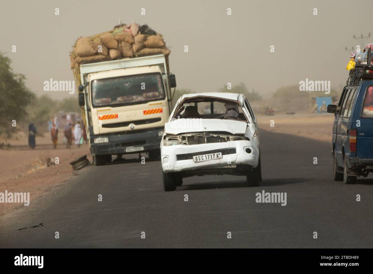 broken car in a chadian road, africa Stock Photo