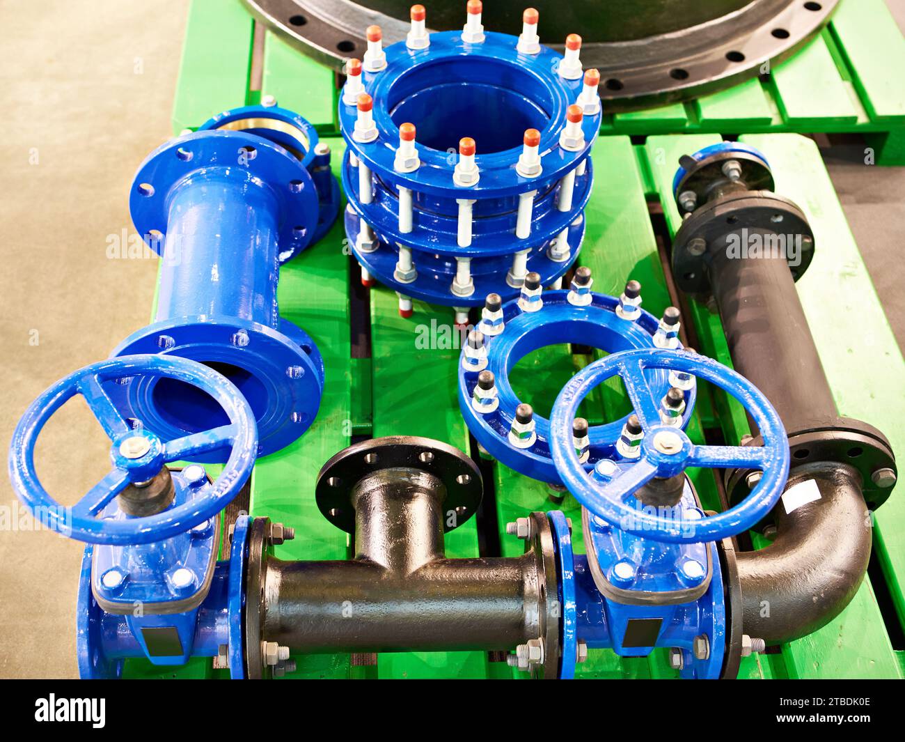 Compensating coupling of shutoff valves of the water supply system at the exhibition Stock