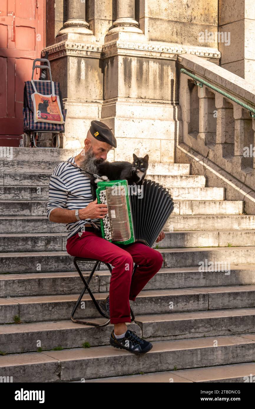Paris, France September 01, 2023 Street musician plays accordion