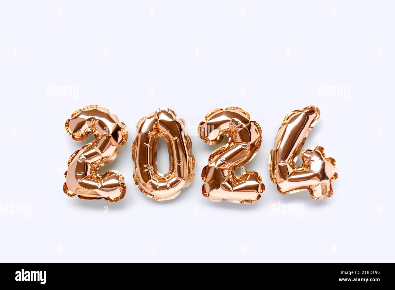 New Year 2024 celebration. Golden Yellow foil color balloons. 2024 balloons.  On Yellow background Stock Photo - Alamy