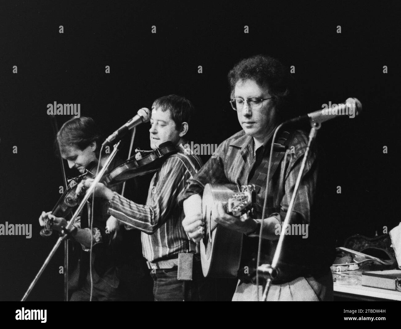 Whippersnapper the  British progressive folk group performing at the Merlin Theatre in Frome, Somerset in January 1987,Chris Leslie, Dave Swarbrick an Stock Photo