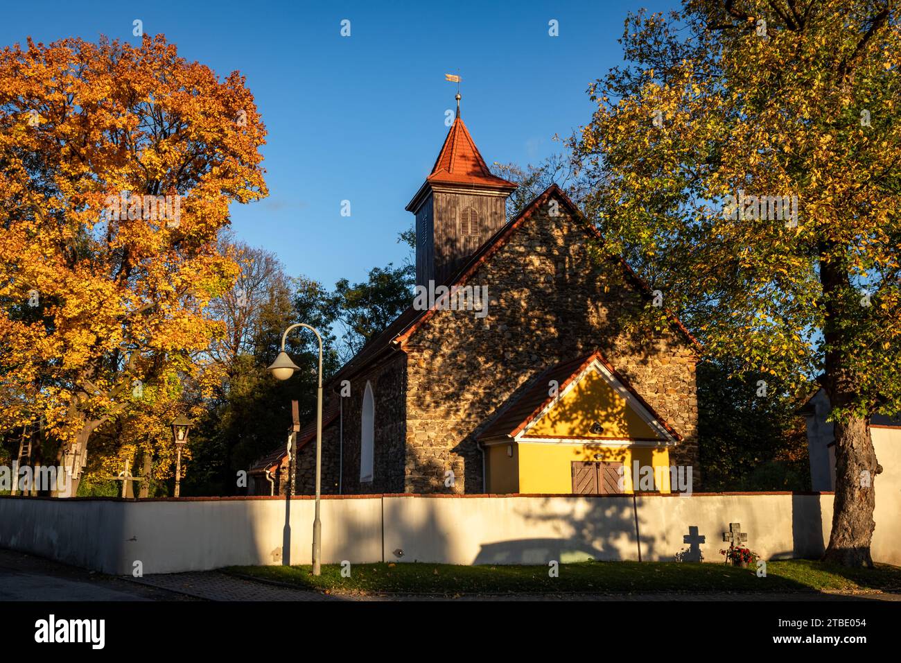 Krzyzowa, Poland - October 29, 2023: Historic gothic church of St Michael the Archangel in the autumn. Stock Photo