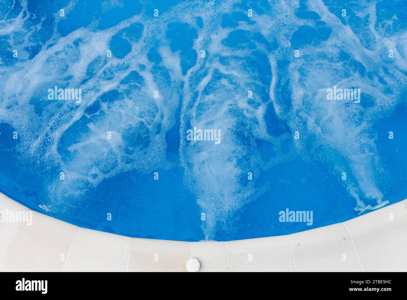 Air bubbles from jacuzzi jet in blue water in a pool. Texture of water surface Stock Photo Alamy