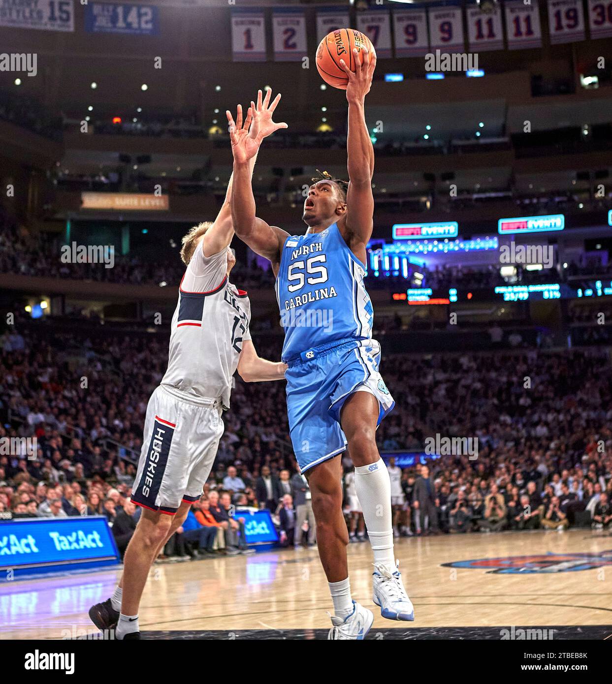 North Carolina Tar Heels forward Harrison Ingram (55) is defended by ...