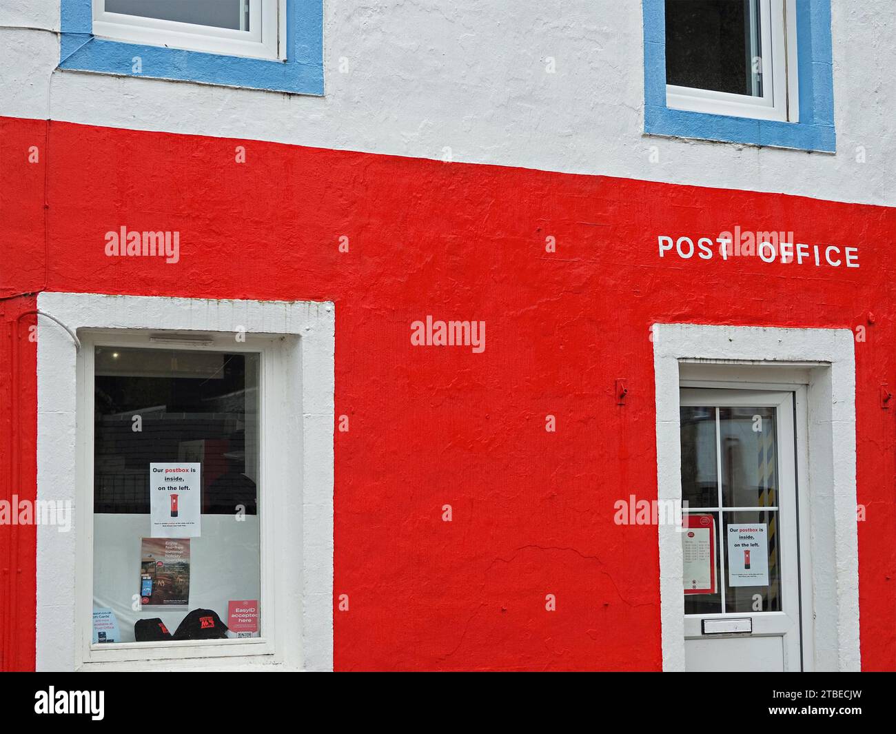 brightly painted red white & blue facade of Post Office in Tobermory