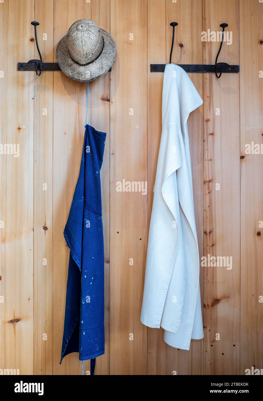 Grande Chartreuse, France - September 30, 2023: Clothing of Carthusian monks: hat, blue work apron and white monk's dress Stock Photo