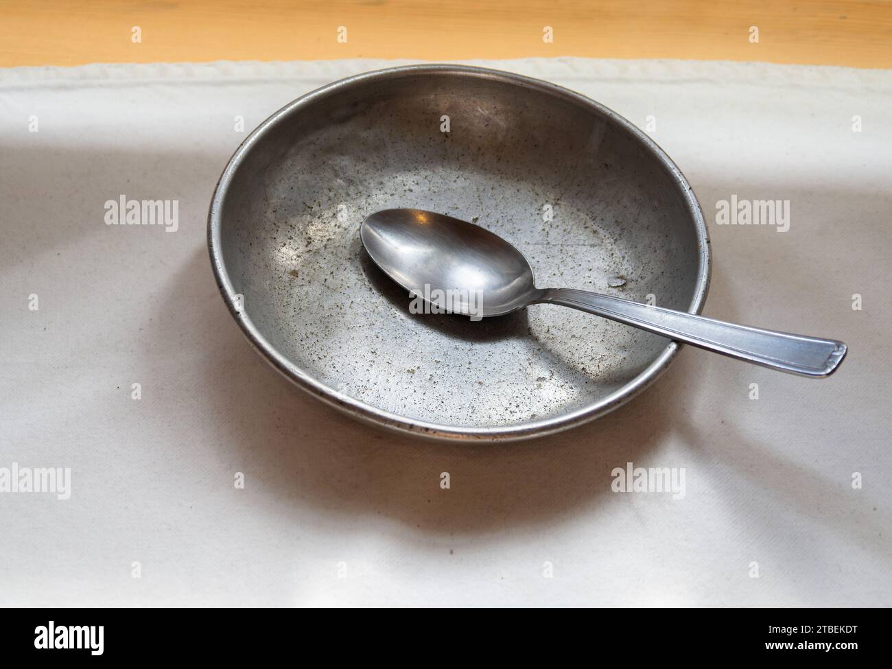 Grande Chartreuse, France - September 30, 2023: Modest Aluminum plate and spoon of the Carthusian monks Stock Photo