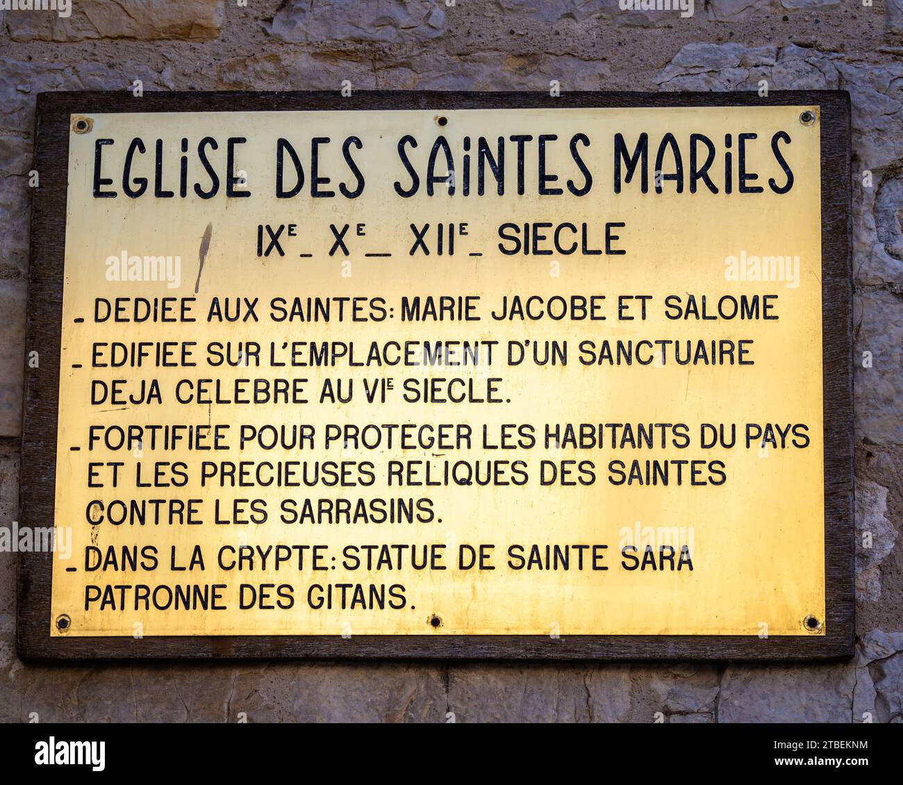 Saintes Maries de la Mer, France - October 3, 2023: Information signboard in Saintes Maries de la Mer explaining in french the history and the meaning Stock Photo