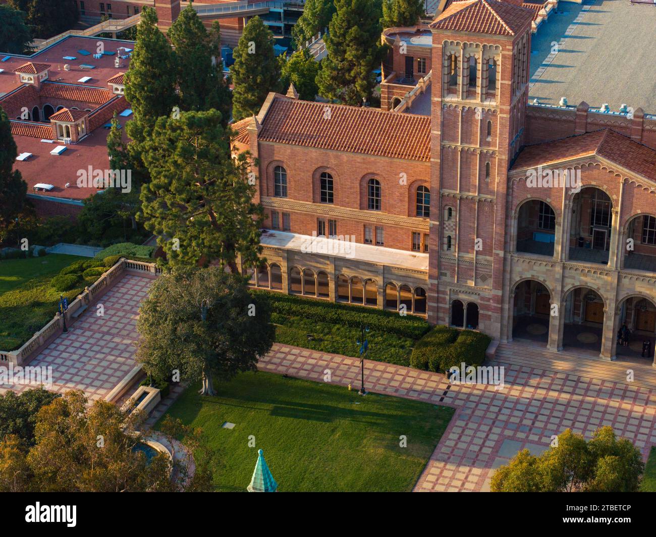 Aerial View of Romanesque Revival University Campus with Red Brick Buildings and Green Lawns Stock Photo