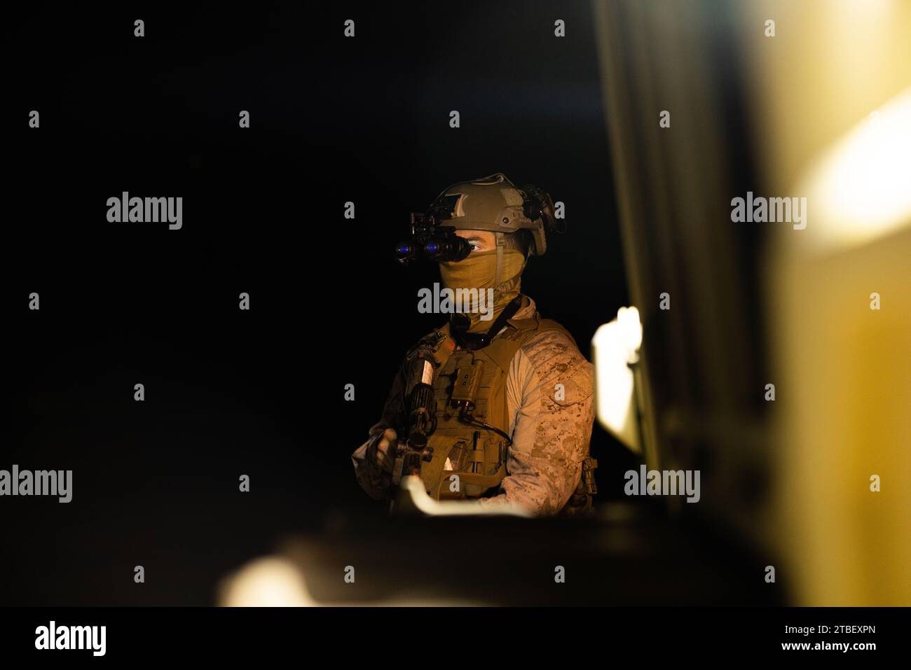 U.S. Navy Petty Officer Third Class Joshua Roland, a hospital corpsman with  Battalion Landing Team 18, 24th Marine Expeditionary Unit, posts security  during Intelligence Interoperability Exercise II on Marine Corps Outlying  Field