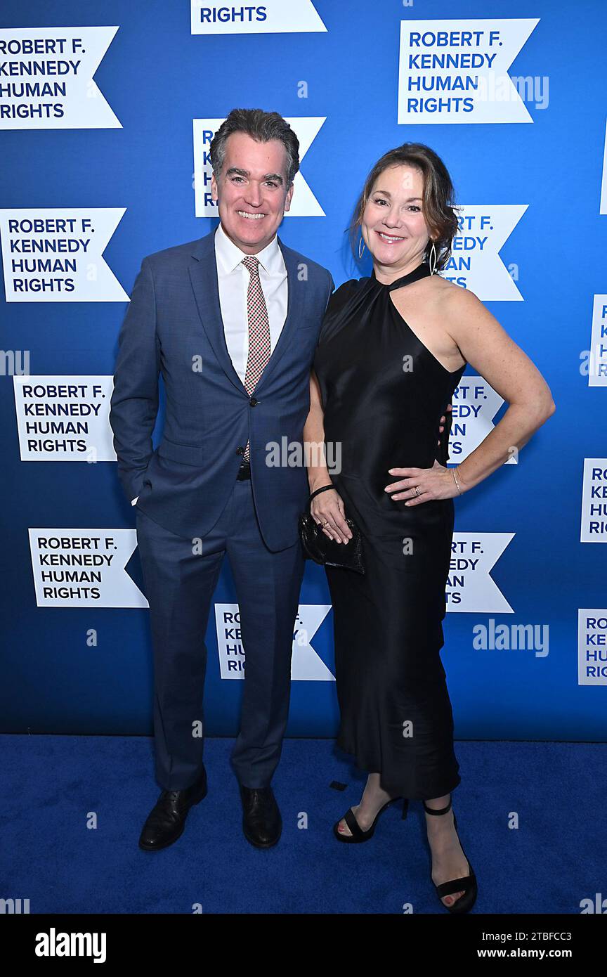 Brian d'Arcy James and wife Jennifer Prescott attend the Robert F Kennedy Ripple of Hope Award Gala at The Midtown Hilton in New York, New York, USA on December 6, 2023. Robin Platzer/ Twin Images/ Credit: Sipa USA/Alamy Live News Stock Photo