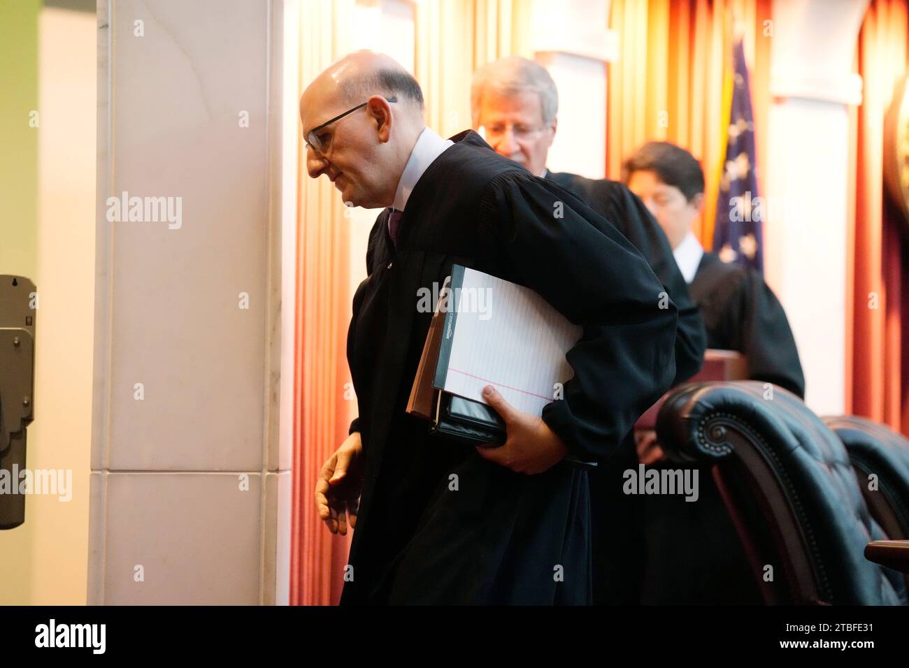 Colorado Supreme Court Justice Carlos Samour Jr. leads out